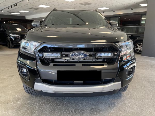 Pins Auto Occasion - 27000,00€ - Le Ford Ranger Wildtrak, Robuste et bien entretenu, Fantastique voiture de travail/voiture de campagne/voiture de chasse avec beaucoup de puissance, une apparence robuste et de bonnes caractéristiques de conduite. Année :  2020 Kilométrage  :  69 400 km Boîte  :  Automatique Carburant  :  Diesel  